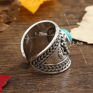Vintage bohemian silver alloy ring with turquoise stone and ethnic relief texture