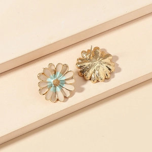 Minimalist daisy flower stud earrings in white and mint green enamel with golden texture