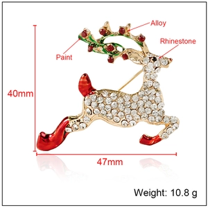 Élégante broche renne dorée ornée de strass brillants et de détails en émail rouge