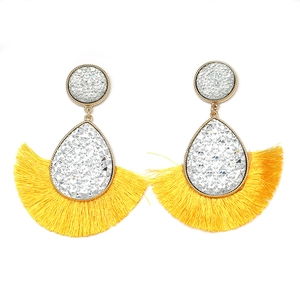 Bohemian crystal teardrop earrings with bright yellow fan tassel on white background