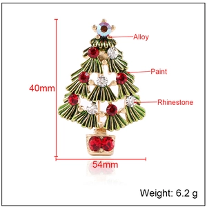 Hollow Christmas tree brooch in gold alloy with red rhinestones and paint detail