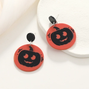Orecchini a zucca di Halloween in acrilico arancione con il classico viso di Jack-o'-lantern