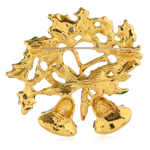 Detail view of the Christmas bell brooch back showing golden alloy and durable pin clasp
