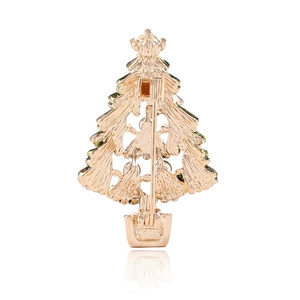 Detailed back view of Christmas tree brooch showing the secure safety pin and golden metal