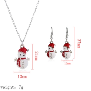 Detailed view of Christmas snowman jewelry set dimensions with necklace and earrings