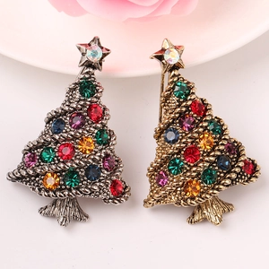 Detailansicht von Vintage Weihnachtsbaum-Broschen in Gold und Silber mit bunten Strasssteinen