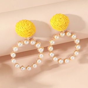 Creative raffia straw drop earrings with gold metal ring and white faux pearls
