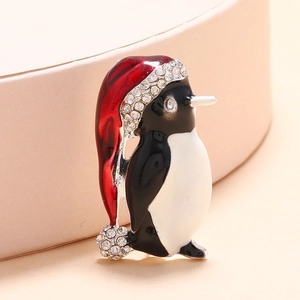 Broche pingouin de Noël créative avec chapeau en émail rouge et strass brillants