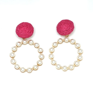 Floral style large gold hoop earrings with rose pink raffia ball and white pearls