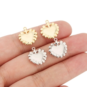 Handheld 18k gold and silver heart pendants with sunburst edges and cross for DIY jewelry
