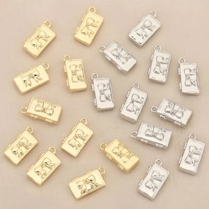 Bowknot luggage-shaped pendants with 18k gold plating and crystal rhinestone accents