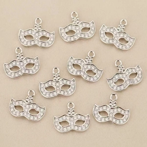 Set of 10 bohemian masquerade mask pendants with sparkling zircons in 18k gold plating