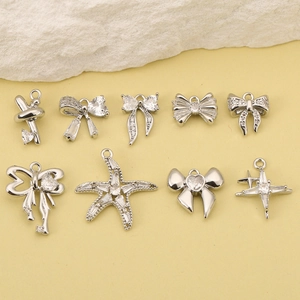 9-piece set of silver copper starfish and bow charms with cubic zirconia for DIY jewelry