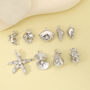 Set di 9 ciondoli marini in argento con stella marina e delfino per gioielli fai-da-te