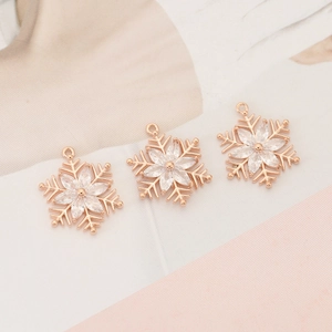 Three rose gold snowflake pendants with zircon stones for DIY necklace jewelry making