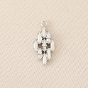 Macro detail of silver geometric cluster pendant with sparkling zircon stones