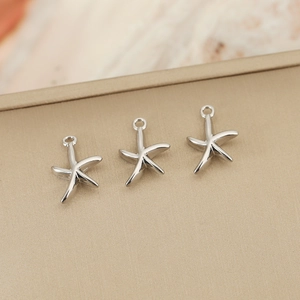 Three polished silver starfish pendants with top rings for DIY jewelry crafting