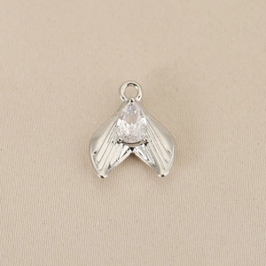 Detailed view of silver fishtail pendant with sparkling pear-cut zircon stone