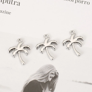 Three polished silver coconut tree pendants with hanging rings for DIY jewelry making