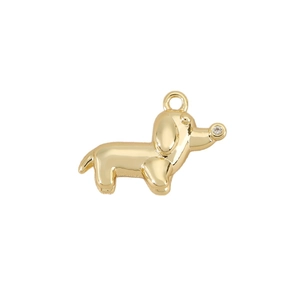 Polished gold dog pendant with zircon nose detail and ring clasp on white background