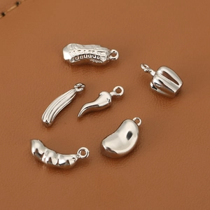 Detailed set of silver vegetable charms including peanut and chili for DIY jewelry making