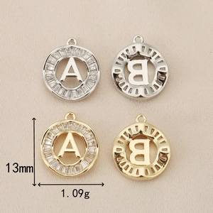 Polished 18K gold and silver plated copper 13mm alphabet charms with zircon stones