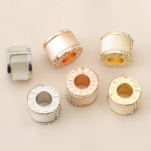 Classic cylinder charm with 'BEAUTY' engraving and crystals in gold, silver, rose gold
