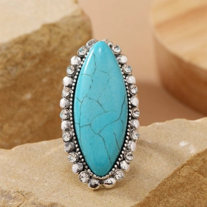 Retro bohemian silver ring featuring marquise turquoise stone with sparkling crystal border
