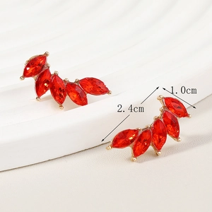 Detail view of 2.4cm red marquise-cut crystal wing earrings with gold metal base