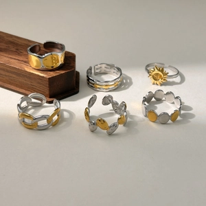 Set de 6 anillos bicolor de oro de 18k y plata en acero inoxidable con diseño minimalista