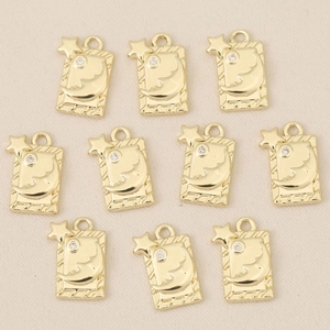 Set of 10 gold plated sun and moon rectangular pendants with sparkling zircon insets