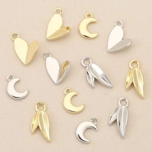 DIY jewelry pendants in heart, moon, and leaf shapes with 18k gold and silver plating