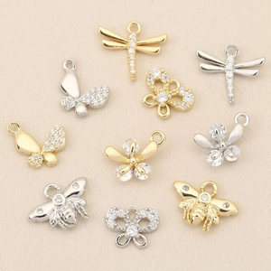 Gold and silver insect pendants with zircons featuring dragonflies and butterflies