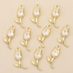 Detail of 10 tulip-shaped gold-plated pendants with inlaid pear-cut zircon stones