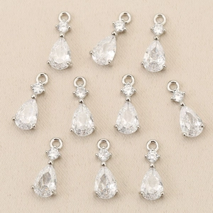 Set of ten silver pear-shaped cubic zirconia charms for DIY jewelry making and pendants