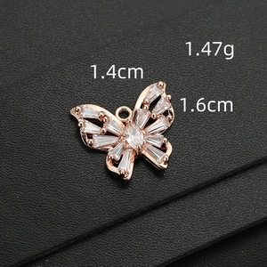Pendentif papillon scintillant avec zircons baguette et marquise, finition or rose