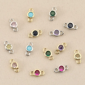 Detail of 18k gold plated copper connectors with colorful cubic zirconia for DIY jewelry