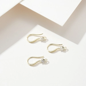 Detail of 18k gold plated copper ear hooks with cubic zirconia for DIY jewelry making