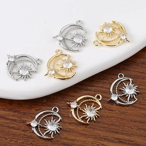 Zirconia studded celestial sun and moon charm pendants in gold and silver plating