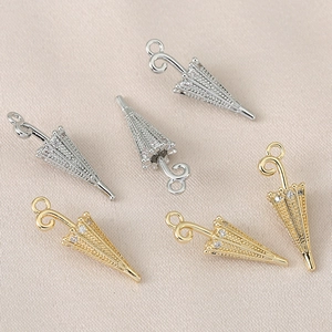 3D umbrella pendant with 18K gold plating and sparkling zircon stones in gold and silver