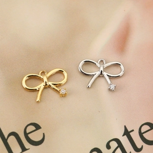 Elegantes colgantes de lazo en oro de 18K y plata con circonitas para joyería DIY