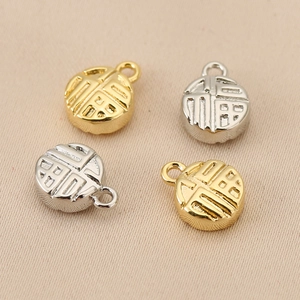 Golden and silver Fu character round pendants with 18K gold plating for jewelry making