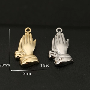 Minimalist 18K gold and silver praying hands pendant with hammered texture for jewelry