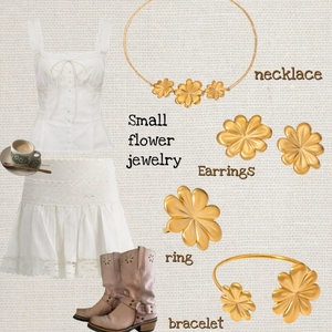 Ensemble de bijoux fleurs dorées comprenant collier, boucles d'oreilles, bague et bracelet