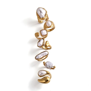 Baroque pearl ring set in gold plated stainless steel featuring seven unique designs