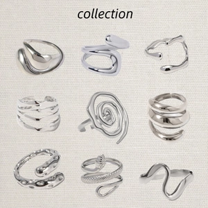 Colección de nueve anillos de acero inoxidable únicos con diseños minimalistas y espiral
