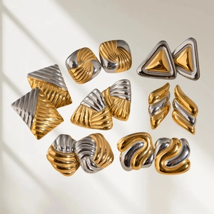 Geometric two-tone stainless steel earrings with textured gold and silver finishes