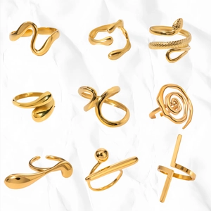 Collection of nine unique 18k gold plated stainless steel open rings in artistic styles