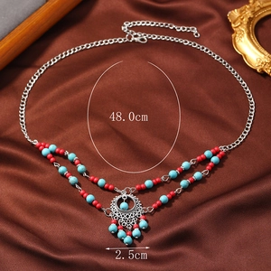 Bohemian silver forehead chain with turquoise beads and ethnic tassel pendant