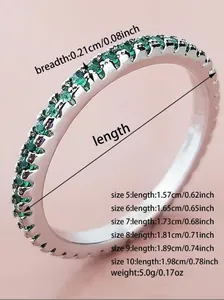 Size chart for eternity band ring featuring emerald stones and technical dimensions